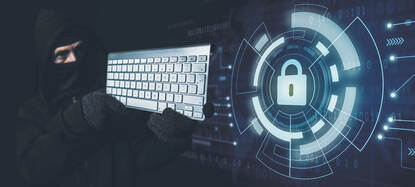 Een man in zwarte bivakmuts richt een toetsenbord alsof het een geweer is.