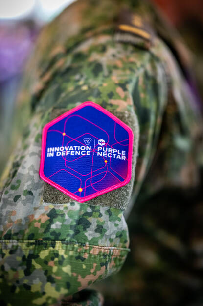 Patch met het logo van Innovation in Defence/Purple NECtar.