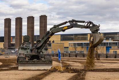 Een Kodiak op een zandplaat.